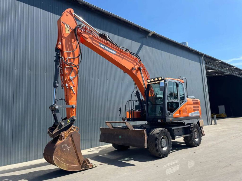 Doosan DX170W-5 - حفار ذو عجلات: صورة 1 Doosan DX170W-5 - حفار ذو عجلات: صورة 1
