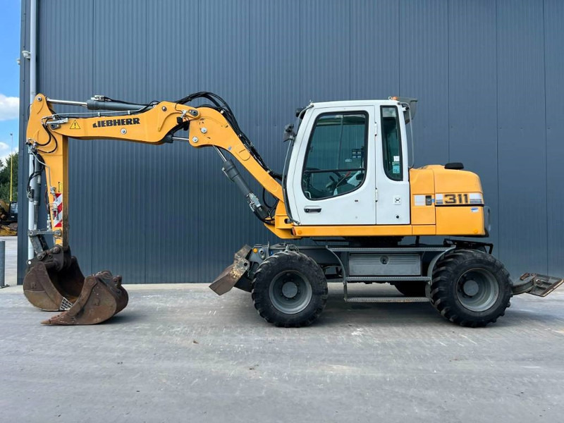 Liebherr A311 Litronic - حفار ذو عجلات: صورة 5 Liebherr A311 Litronic - حفار ذو عجلات: صورة 5