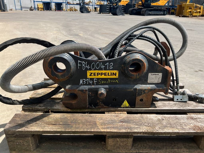 OilQuick OQ65 - M314F / M316F / M318F - قارنة التوصيل السريعة - آلات الإنشاء: صورة 4 OilQuick OQ65 - M314F / M316F / M318F - قارنة التوصيل السريعة - آلات الإنشاء: صورة 4