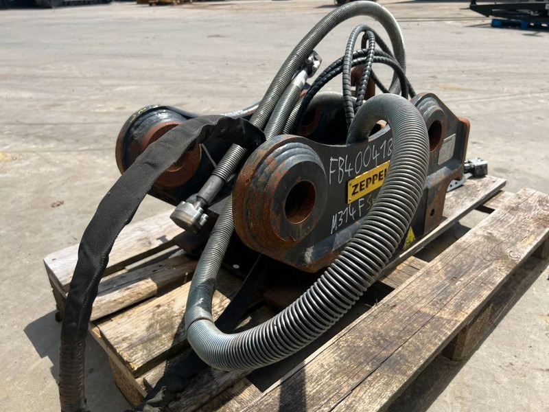 OilQuick OQ65 - M314F / M316F / M318F - قارنة التوصيل السريعة - آلات الإنشاء: صورة 5 OilQuick OQ65 - M314F / M316F / M318F - قارنة التوصيل السريعة - آلات الإنشاء: صورة 5