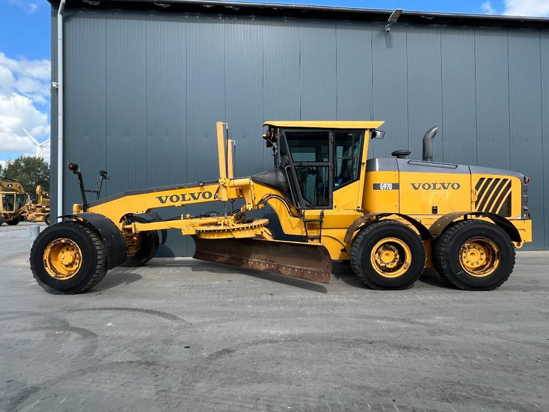 Volvo G970 - ماكينة تسوية: صورة 2 Volvo G970 - ماكينة تسوية: صورة 2