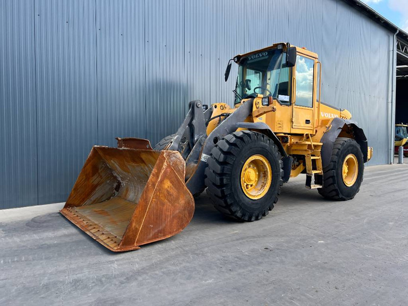 Volvo L60E - اللودر بعجل: صورة 1 Volvo L60E - اللودر بعجل: صورة 1