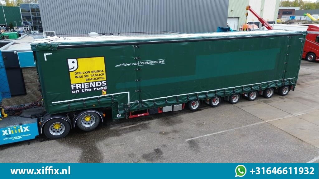 Meusburger 6-ass. Semi dieplader met elektische huifopbouw / 3x naloop gestuurd - نصف مقطورة بلودر منخفض: صورة 1 Meusburger 6-ass. Semi dieplader met elektische huifopbouw / 3x naloop gestuurd - نصف مقطورة بلودر منخفض: صورة 1