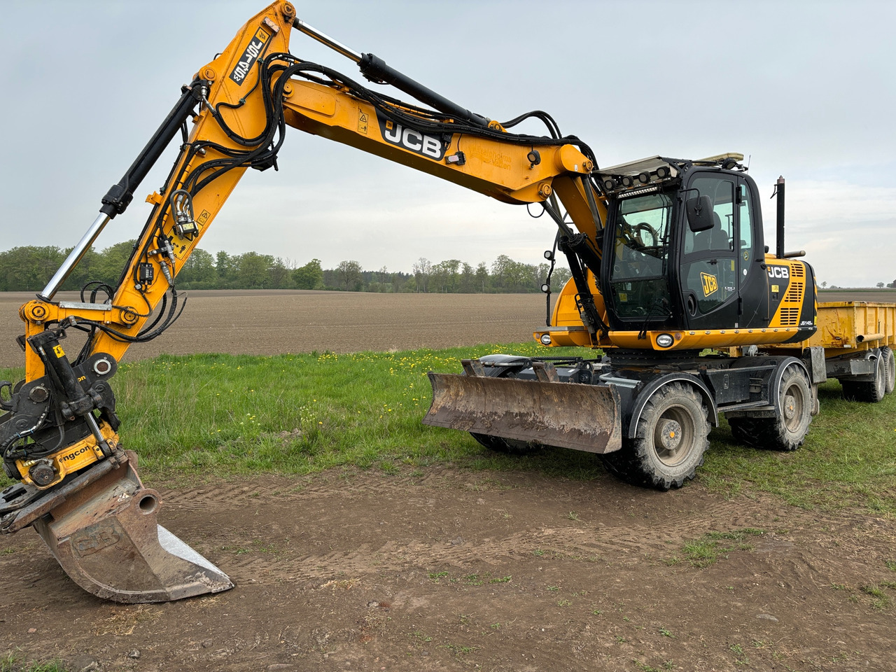 JCB JS145W - حفّار: صورة 1 JCB JS145W - حفّار: صورة 1