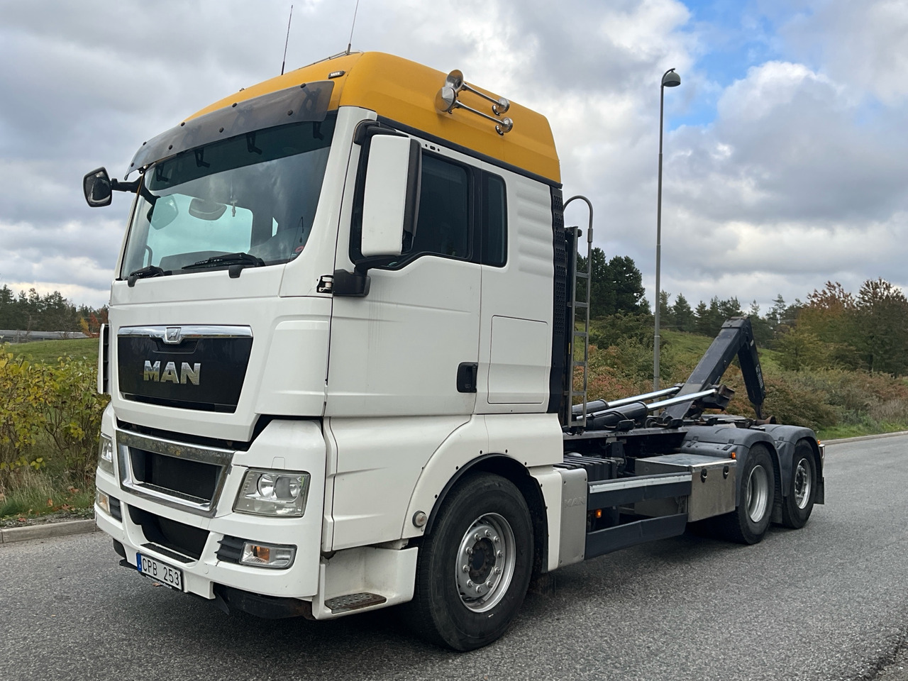 MAN TGX 26.480 - شاحنة برافعة خطافية: صورة 1 MAN TGX 26.480 - شاحنة برافعة خطافية: صورة 1