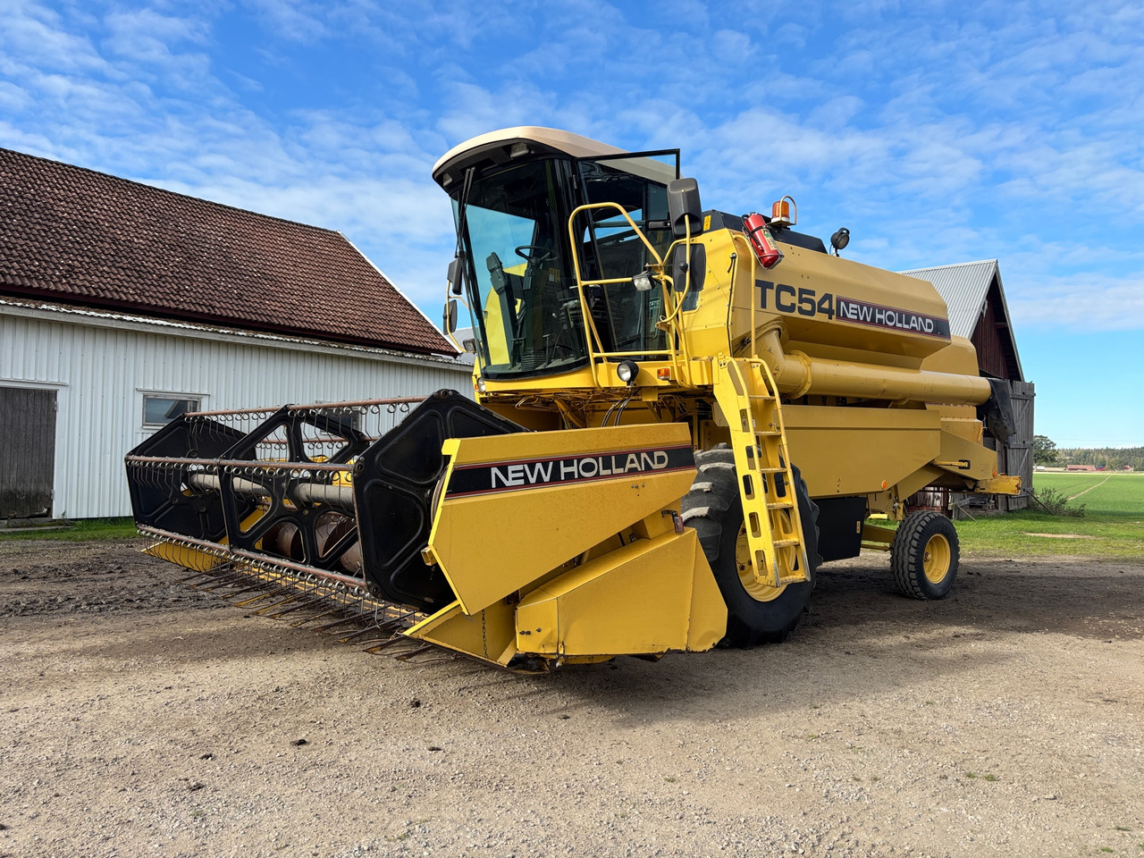 New Holland TC54 - حصادة: صورة 1 New Holland TC54 - حصادة: صورة 1