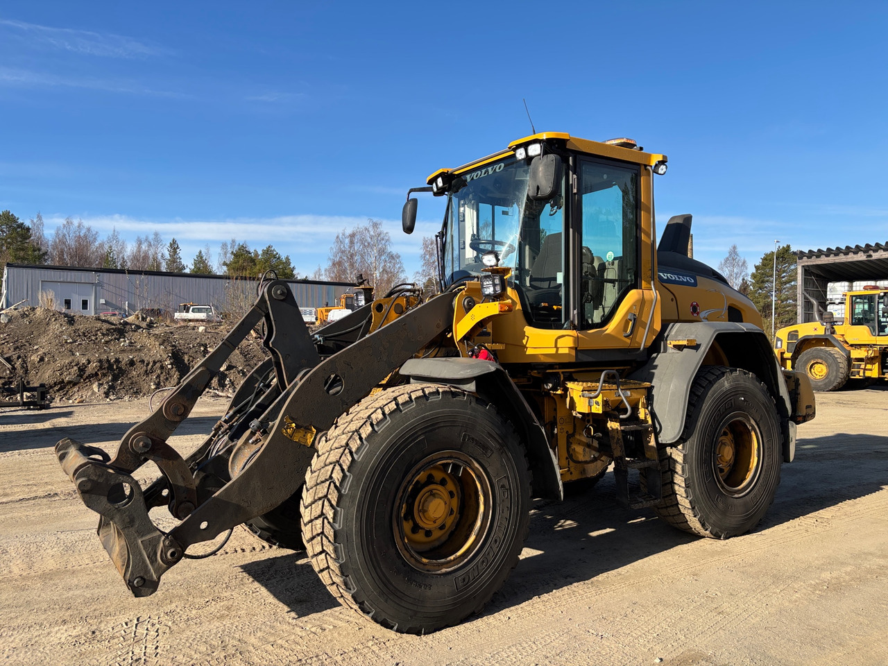 Volvo L60H - اللودر بعجل: صورة 1 Volvo L60H - اللودر بعجل: صورة 1