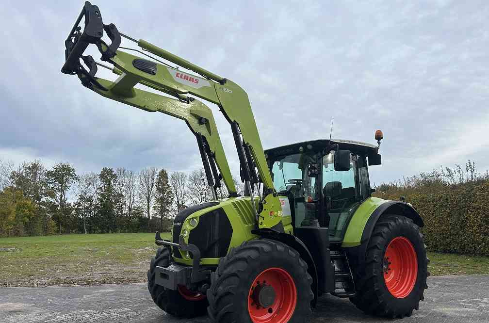 Claas Arion 640 cis, lucht, frontlader - جرار: صورة 1 Claas Arion 640 cis, lucht, frontlader - جرار: صورة 1
