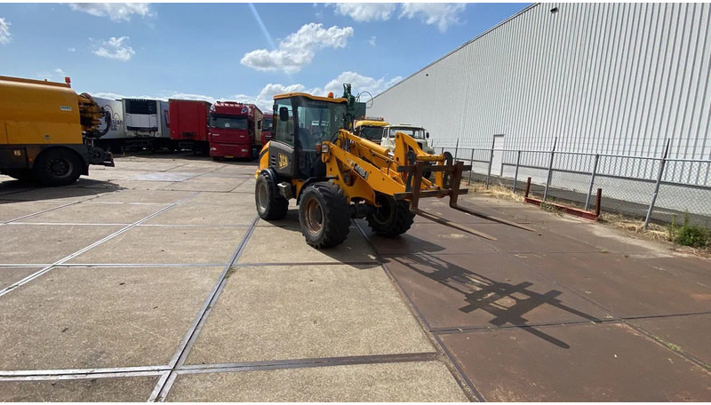 JCB KNIKSCHOVEL 406 - اللودر بعجل: صورة 1 JCB KNIKSCHOVEL 406 - اللودر بعجل: صورة 1