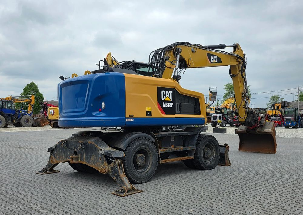 Caterpillar M318F, 2018 ROK, PODPORY + PŁUG, ROTOTILT - حفار ذو عجلات: صورة 5 Caterpillar M318F, 2018 ROK, PODPORY + PŁUG, ROTOTILT - حفار ذو عجلات: صورة 5