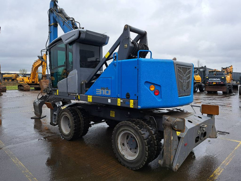 Fuchs MHL310F + Grapple - آلة التعامل مع النفايات: صورة 5 Fuchs MHL310F + Grapple - آلة التعامل مع النفايات: صورة 5