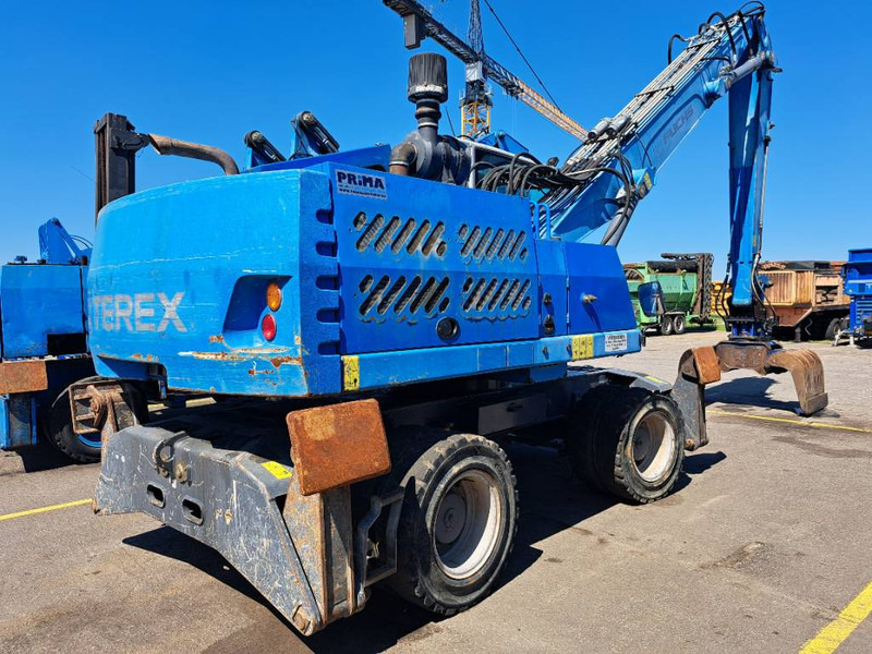 Fuchs MHL331E + Grapple - آلة التعامل مع النفايات: صورة 1 Fuchs MHL331E + Grapple - آلة التعامل مع النفايات: صورة 1