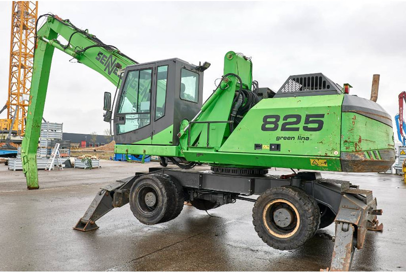 Sennebogen 825M-C - آلة التعامل مع النفايات: صورة 1 Sennebogen 825M-C - آلة التعامل مع النفايات: صورة 1