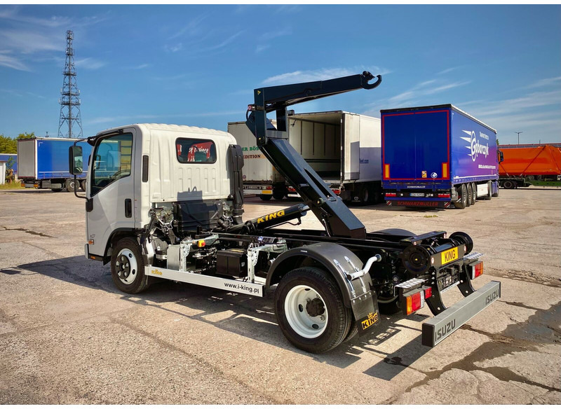 Isuzu M27 - شاحنة برافعة خطافية: صورة 1 Isuzu M27 - شاحنة برافعة خطافية: صورة 1