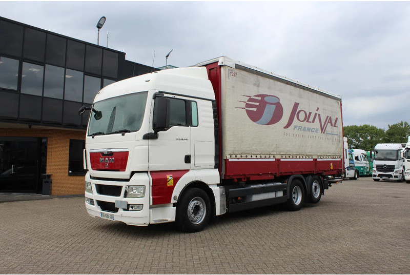 MAN TGX 26.440 * EURO5 * 6X2 * LIFT AXLE * - شاحنة ذات ستائر جانبية: صورة 1 MAN TGX 26.440 * EURO5 * 6X2 * LIFT AXLE * - شاحنة ذات ستائر جانبية: صورة 1