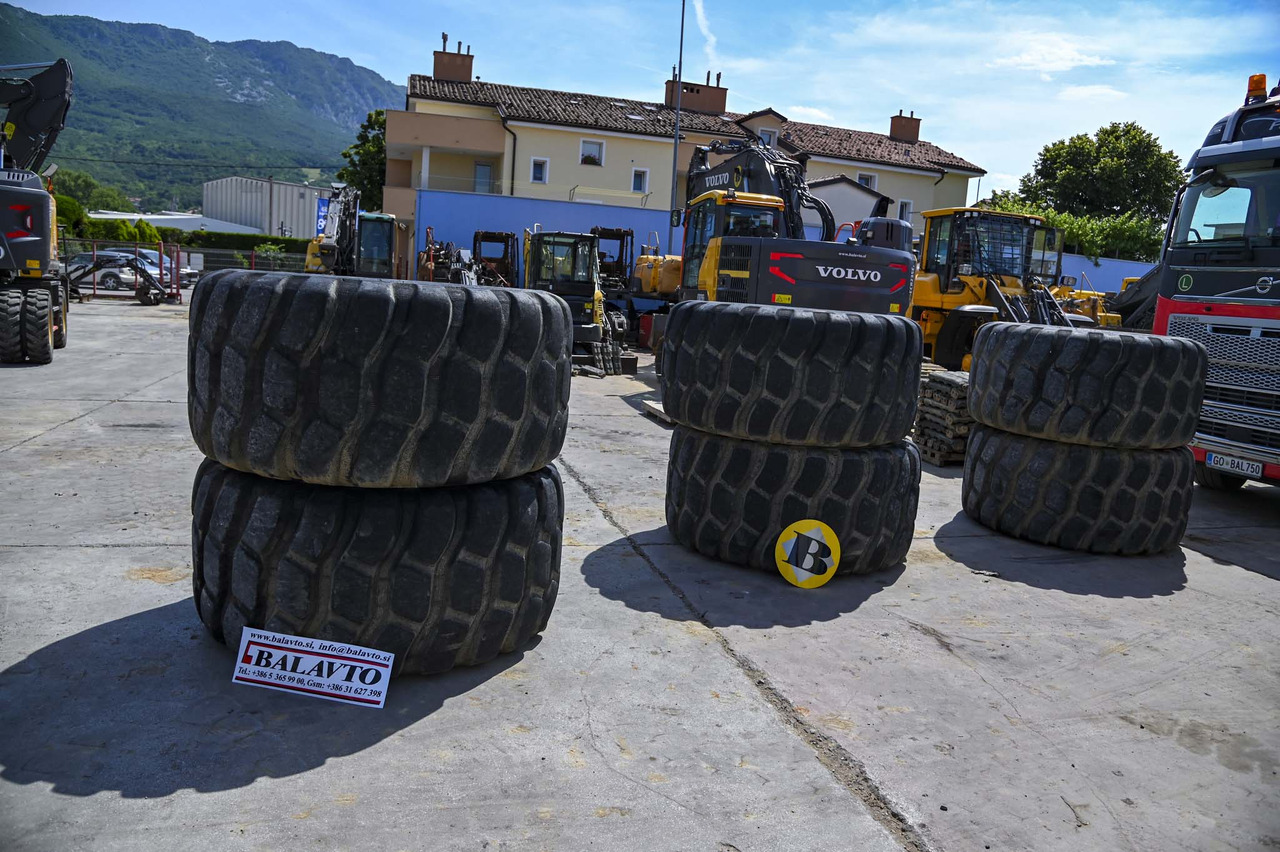 Bridgestone tires 30/65R25 with rims - عجلات - شاحنة قلاب التعدين: صورة 2 Bridgestone tires 30/65R25 with rims - عجلات - شاحنة قلاب التعدين: صورة 2