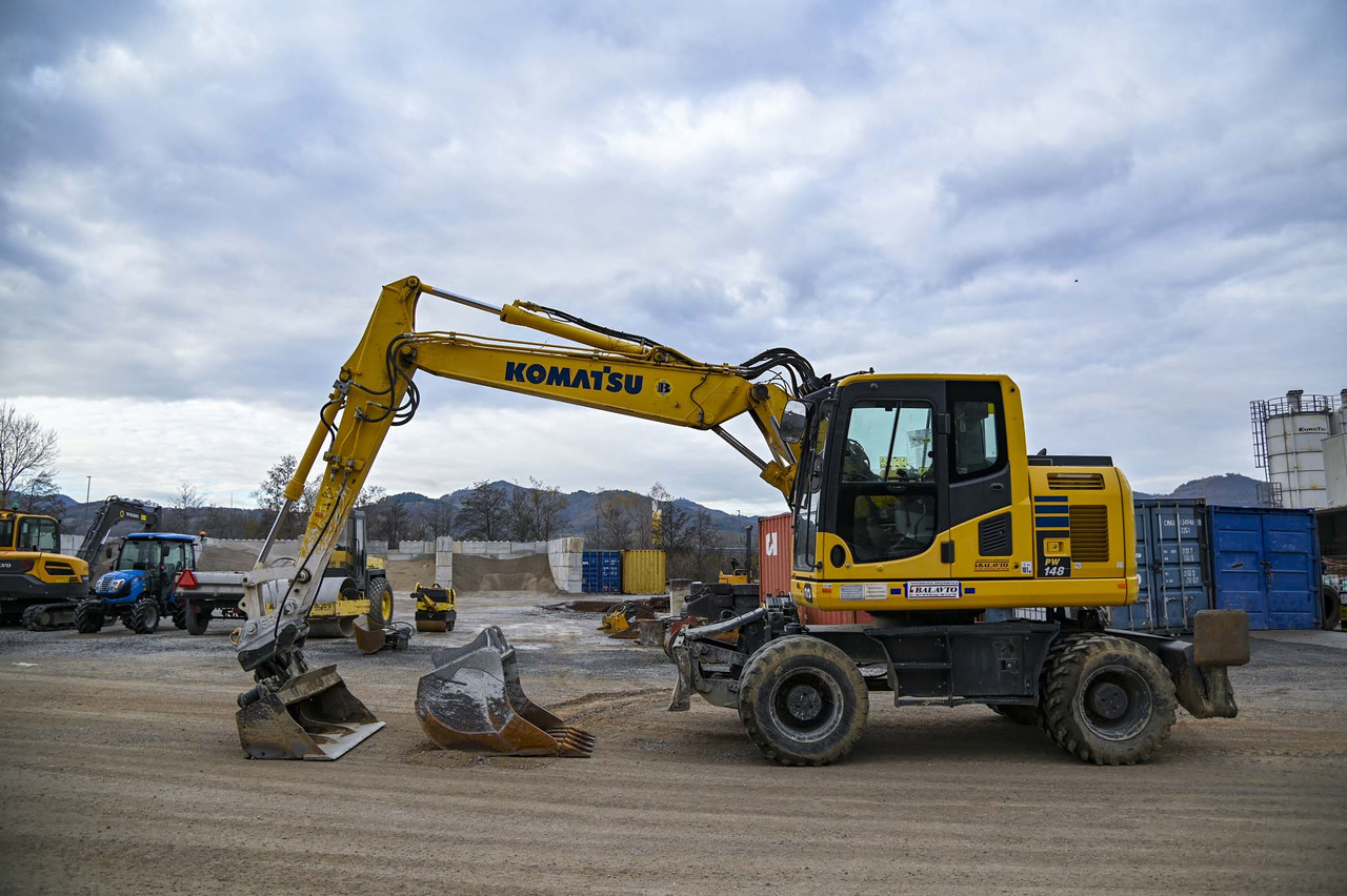 KOMATSU PW148-10 - حفار ذو عجلات: صورة 2 KOMATSU PW148-10 - حفار ذو عجلات: صورة 2