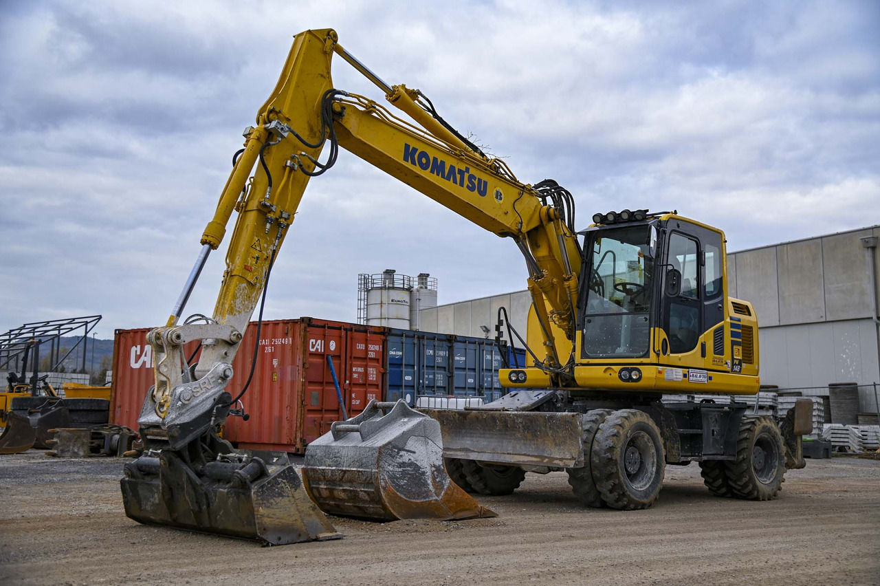 KOMATSU PW148-10 - حفار ذو عجلات: صورة 1 KOMATSU PW148-10 - حفار ذو عجلات: صورة 1