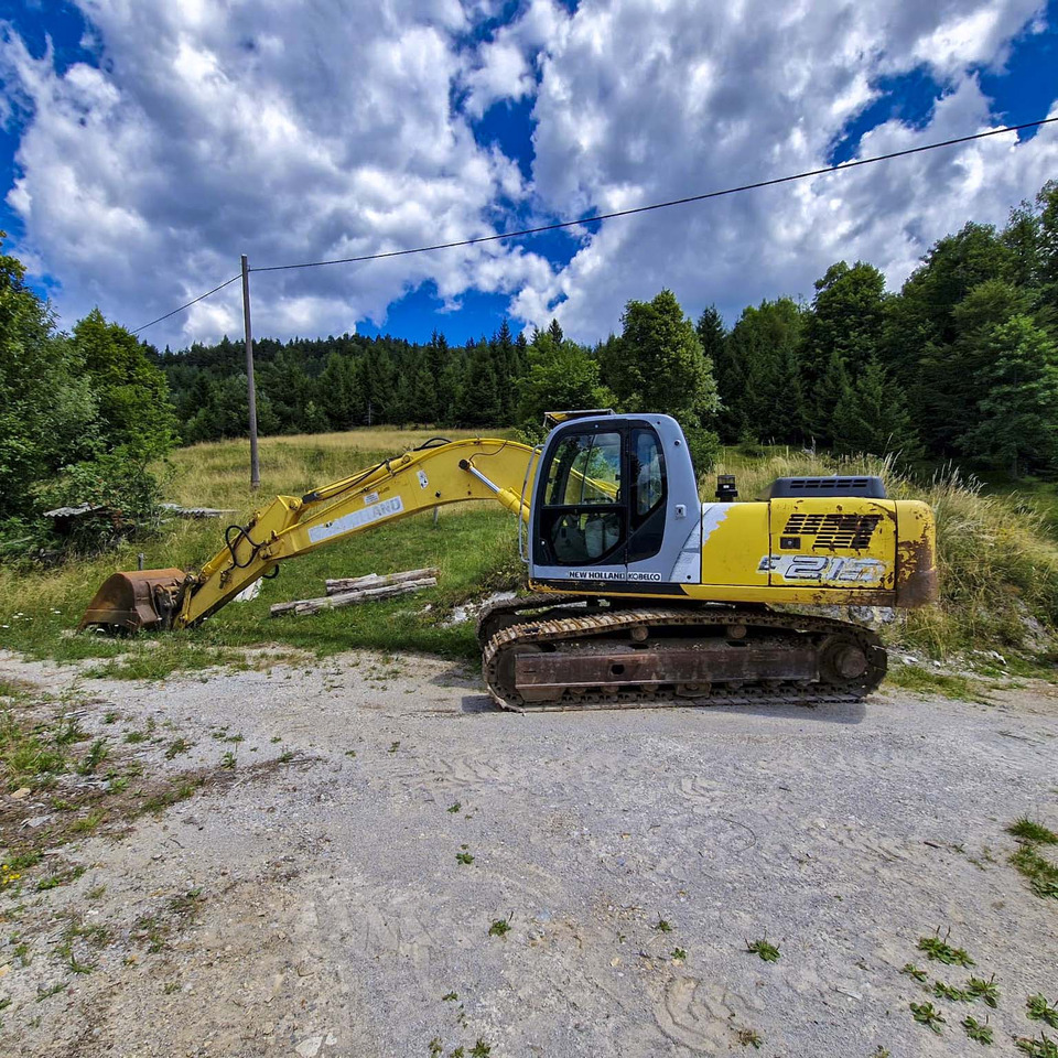 New Holland Kobelco E215 - حفار زاحف: صورة 1 New Holland Kobelco E215 - حفار زاحف: صورة 1