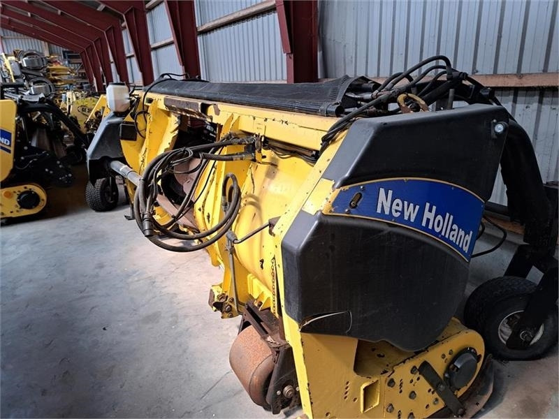 New Holland 283 Græs pick-up - ماكينات نشر التبن: صورة 1 New Holland 283 Græs pick-up - ماكينات نشر التبن: صورة 1