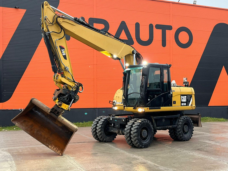 Caterpillar M316D / ROTOTILT/ AC / CENTRAL LUBRICATION / + EXTRA BUCKET - حفار ذو عجلات: صورة 1 Caterpillar M316D / ROTOTILT/ AC / CENTRAL LUBRICATION / + EXTRA BUCKET - حفار ذو عجلات: صورة 1