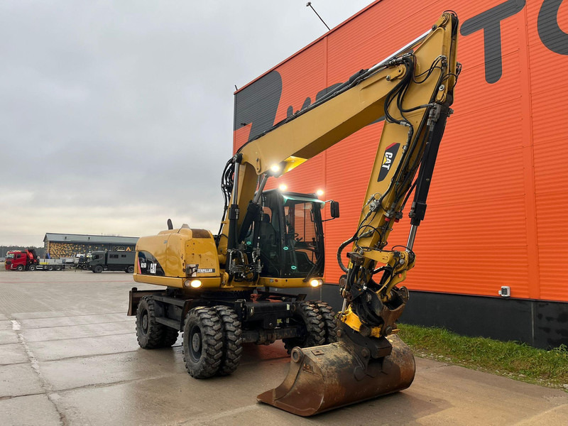 Caterpillar M316D / ROTOTILT/ AC / CENTRAL LUBRICATION / + EXTRA BUCKET - حفار ذو عجلات: صورة 3 Caterpillar M316D / ROTOTILT/ AC / CENTRAL LUBRICATION / + EXTRA BUCKET - حفار ذو عجلات: صورة 3