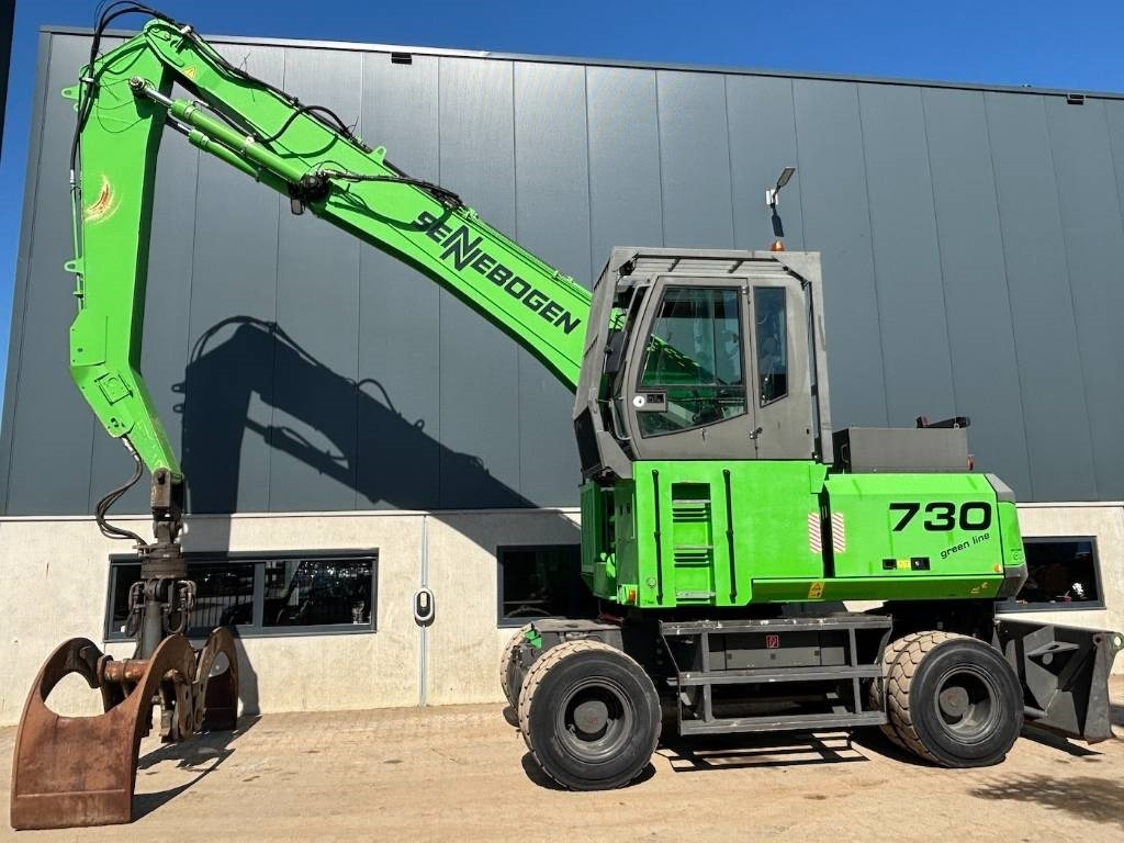 Sennebogen 730 -- Wood application -- incl grapple - آلة التعامل مع النفايات: صورة 1 Sennebogen 730 -- Wood application -- incl grapple - آلة التعامل مع النفايات: صورة 1
