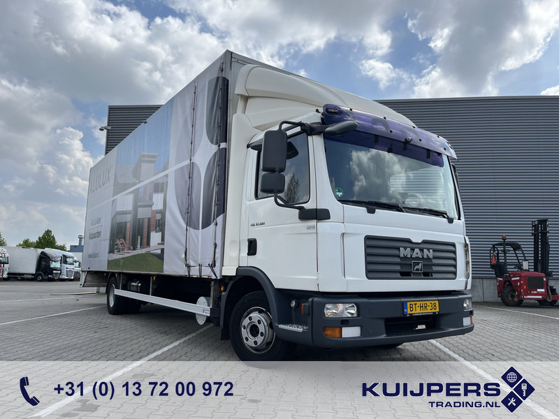 MAN TGL 12.180 / 12 Ton / 781 dkm / Oil Leak / Canvas Box / NL Truck - شاحنة صندوقية: صورة 1 MAN TGL 12.180 / 12 Ton / 781 dkm / Oil Leak / Canvas Box / NL Truck - شاحنة صندوقية: صورة 1