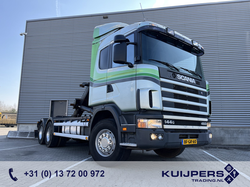 Scania R 144G V8 460 6x2 Boogie / 874 dkm / Blad - Blad / Hook Lift / NL Truck - شاحنة برافعة خطافية: صورة 1 Scania R 144G V8 460 6x2 Boogie / 874 dkm / Blad - Blad / Hook Lift / NL Truck - شاحنة برافعة خطافية: صورة 1