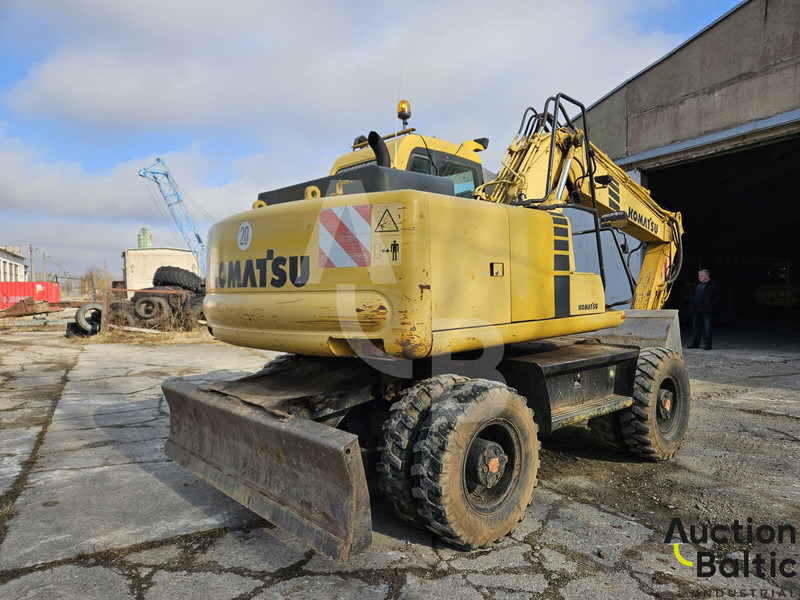 Komatsu PW130ES-6K - حفار ذو عجلات: صورة 3 Komatsu PW130ES-6K - حفار ذو عجلات: صورة 3