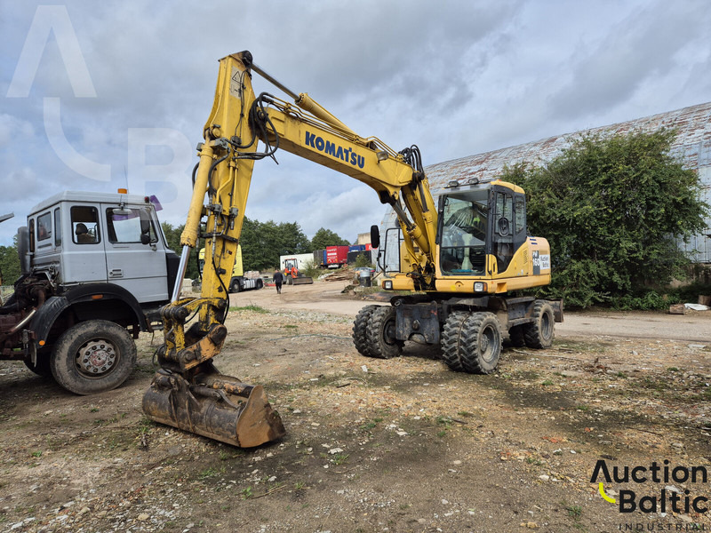 Komatsu PW160-7 - حفار ذو عجلات: صورة 1 Komatsu PW160-7 - حفار ذو عجلات: صورة 1