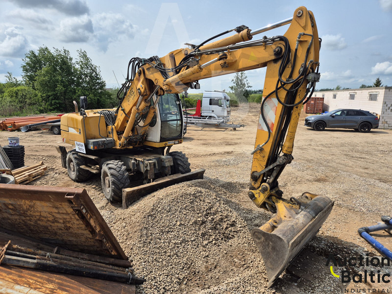 Liebherr A 316 Litronic - حفار ذو عجلات: صورة 2 Liebherr A 316 Litronic - حفار ذو عجلات: صورة 2