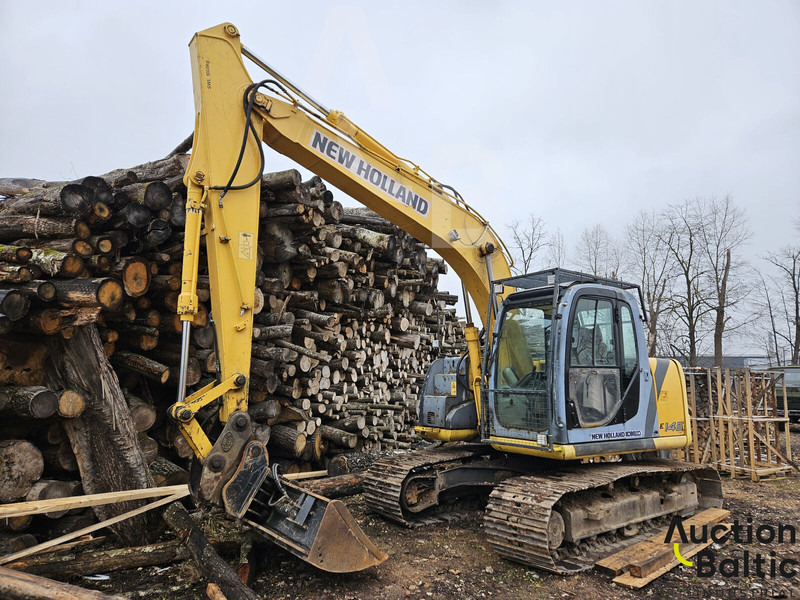 New Holland E 145 - حفار زاحف: صورة 1 New Holland E 145 - حفار زاحف: صورة 1