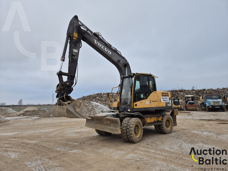 Volvo EW 140 C - حفار ذو عجلات: صورة 1 Volvo EW 140 C - حفار ذو عجلات: صورة 1