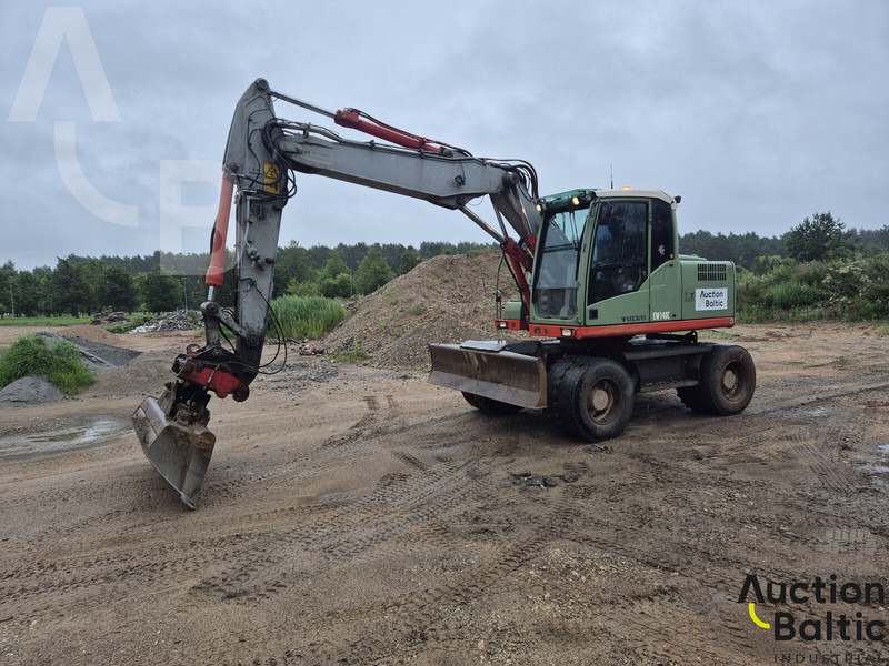 Volvo EW 140 C - حفار ذو عجلات: صورة 1 Volvo EW 140 C - حفار ذو عجلات: صورة 1
