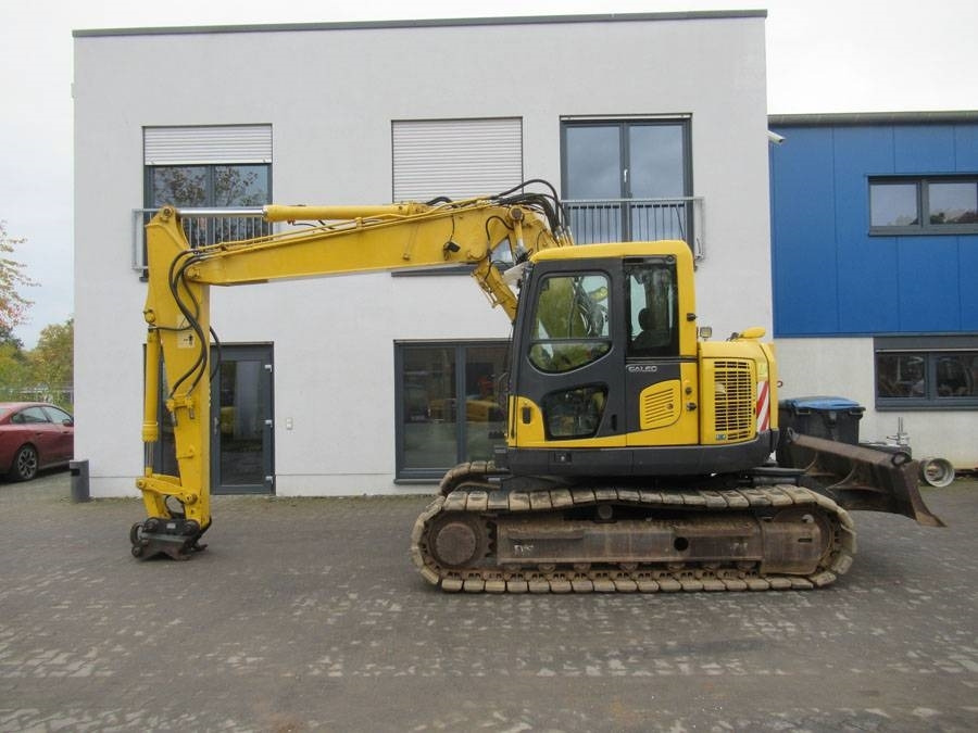 Komatsu PC138 US-8 - حفار زاحف: صورة 1 Komatsu PC138 US-8 - حفار زاحف: صورة 1