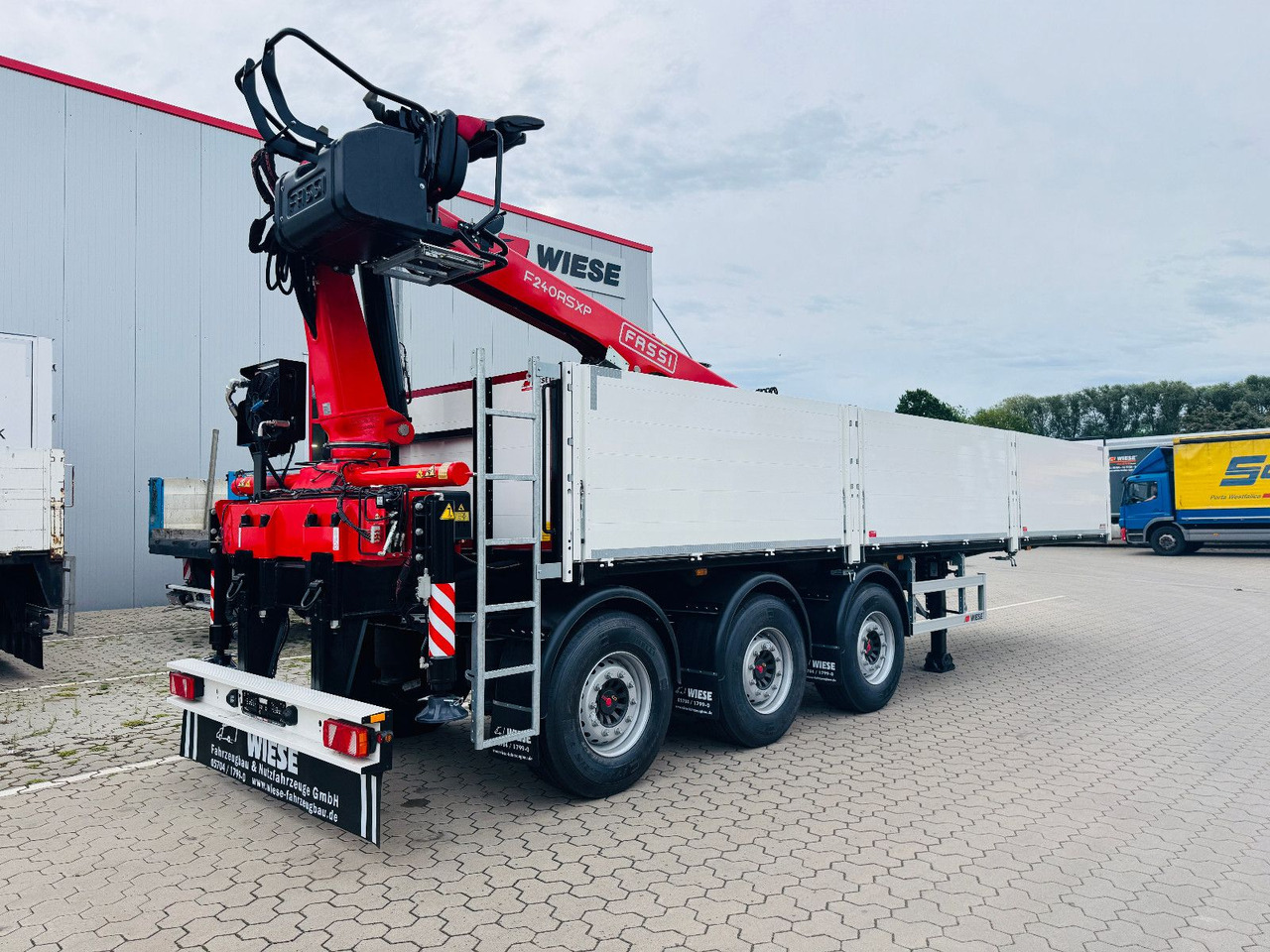 Wiese Baustoffauflieger - Heckkran Kran Fassi - نصف مقطورة مسطحة: صورة 5 Wiese Baustoffauflieger - Heckkran Kran Fassi - نصف مقطورة مسطحة: صورة 5
