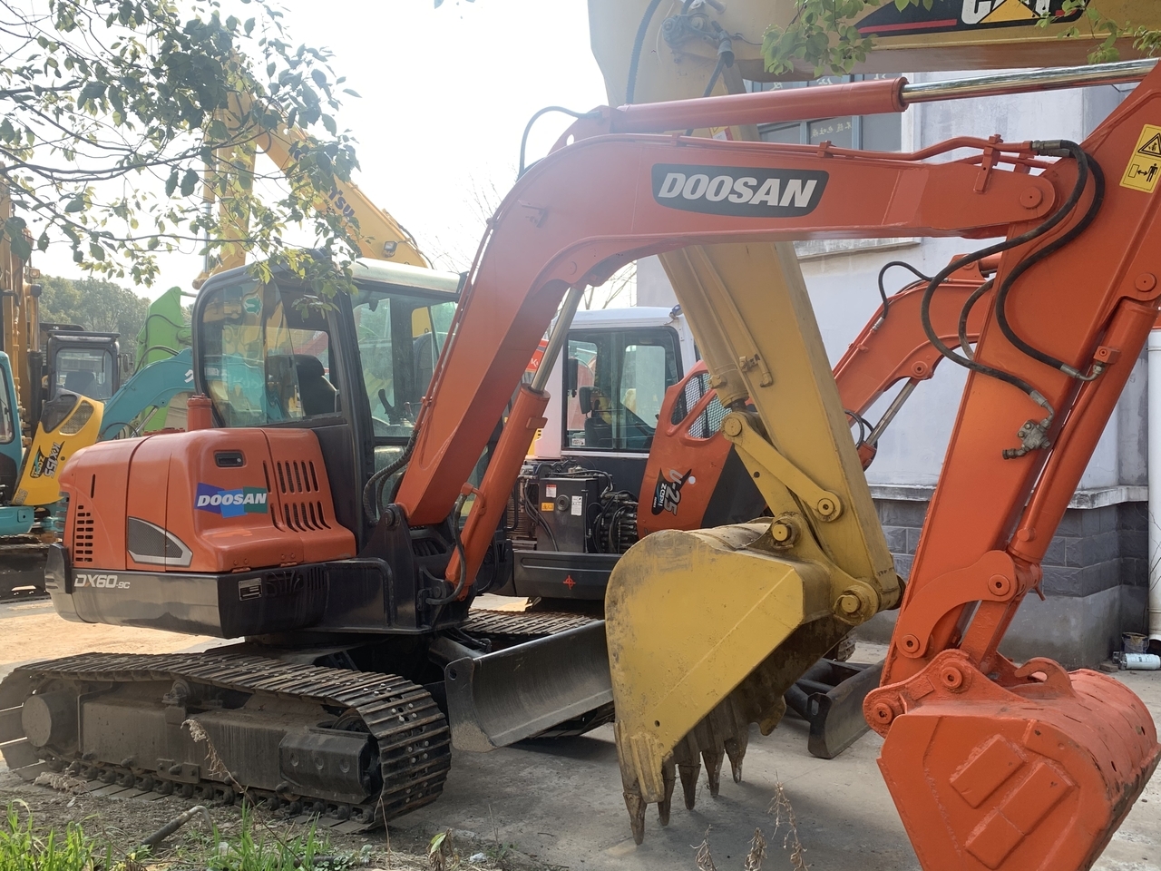DOOSAN DX60-9 - حفار صغير: صورة 1 DOOSAN DX60-9 - حفار صغير: صورة 1