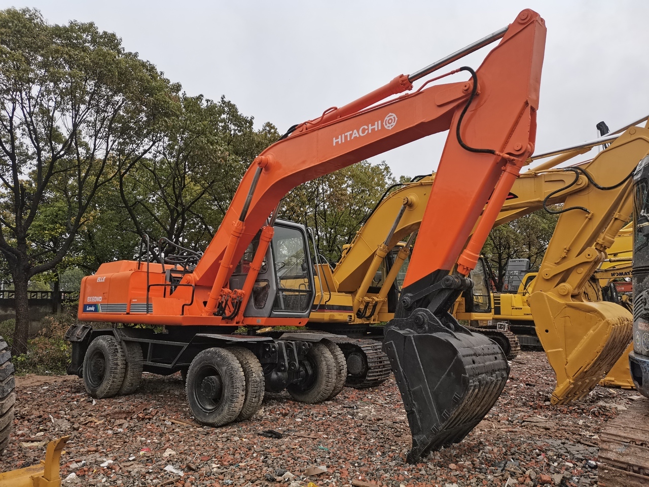 HITACHI EX160WD - حفار ذو عجلات: صورة 1 HITACHI EX160WD - حفار ذو عجلات: صورة 1