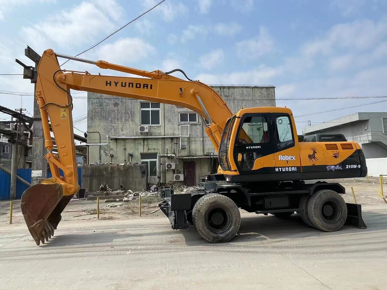 HYUNDAI 210W-9 - حفار ذو عجلات: صورة 3 HYUNDAI 210W-9 - حفار ذو عجلات: صورة 3