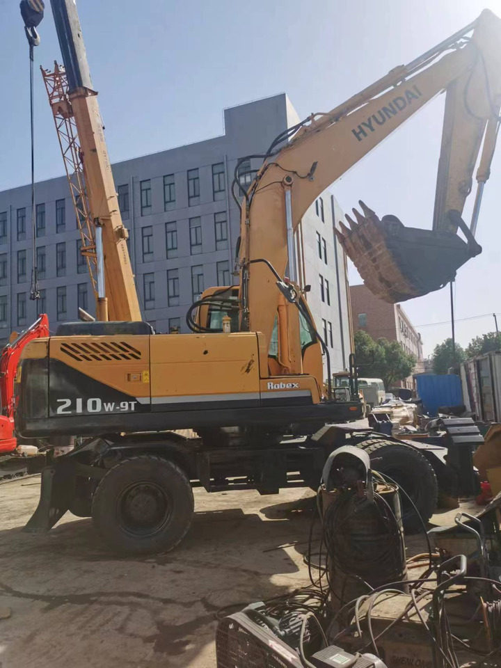 HYUNDAI R210W-9 - حفار ذو عجلات: صورة 1 HYUNDAI R210W-9 - حفار ذو عجلات: صورة 1