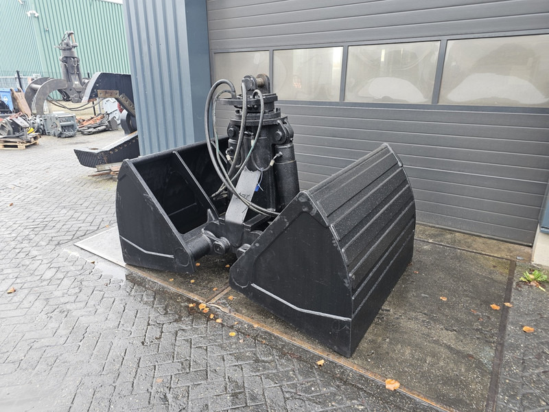 Sennebogen clamshell bucket 1800l hgt sennebogen overslaggrijper 1800l - مغراف الغراف الصدفي - آلات الإنشاء: صورة 2 Sennebogen clamshell bucket 1800l hgt sennebogen overslaggrijper 1800l - مغراف الغراف الصدفي - آلات الإنشاء: صورة 2