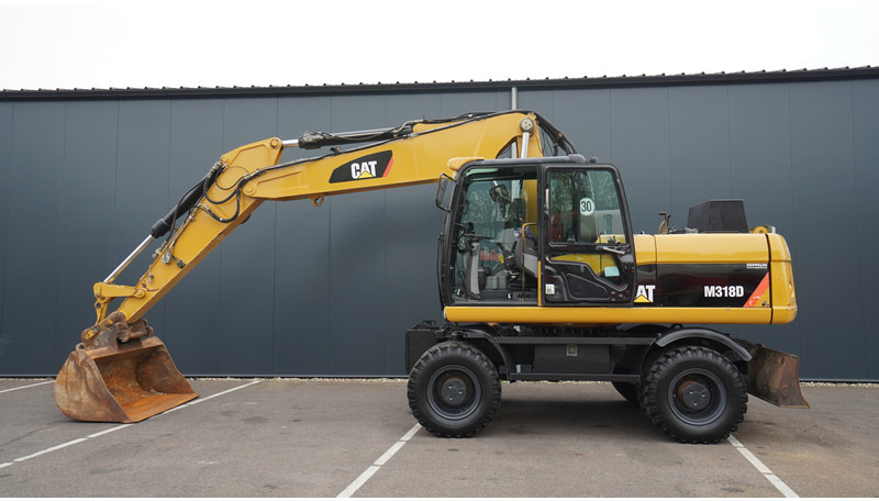 Caterpillar M318D 4X4 WHEELED EXCAVATOR - آلات الإنشاء: صورة 1 Caterpillar M318D 4X4 WHEELED EXCAVATOR - آلات الإنشاء: صورة 1
