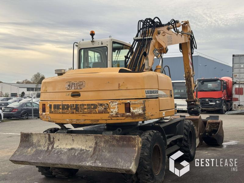 Liebherr A312 Litronic - حفار ذو عجلات: صورة 3 Liebherr A312 Litronic - حفار ذو عجلات: صورة 3