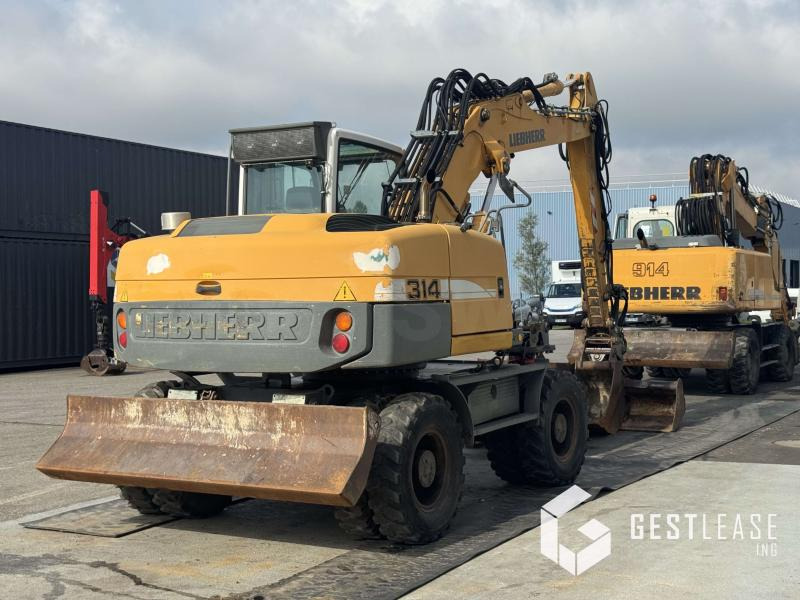 Liebherr A314 Litronic - حفار ذو عجلات: صورة 4 Liebherr A314 Litronic - حفار ذو عجلات: صورة 4