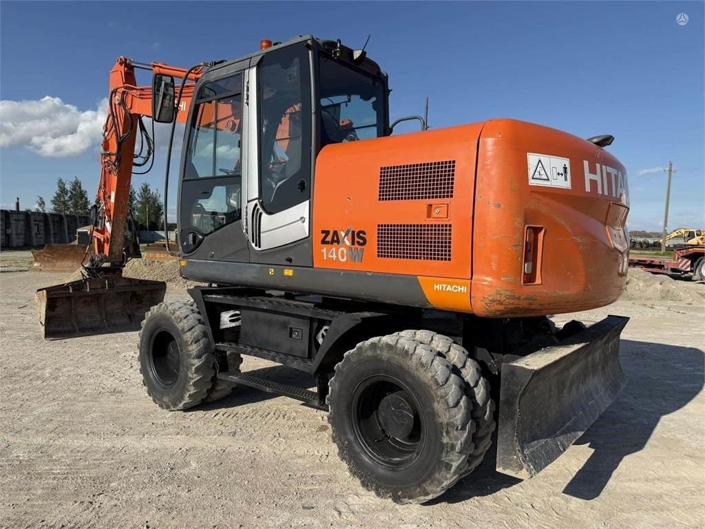 Hitachi ZX 140 W - حفار ذو عجلات: صورة 1 Hitachi ZX 140 W - حفار ذو عجلات: صورة 1