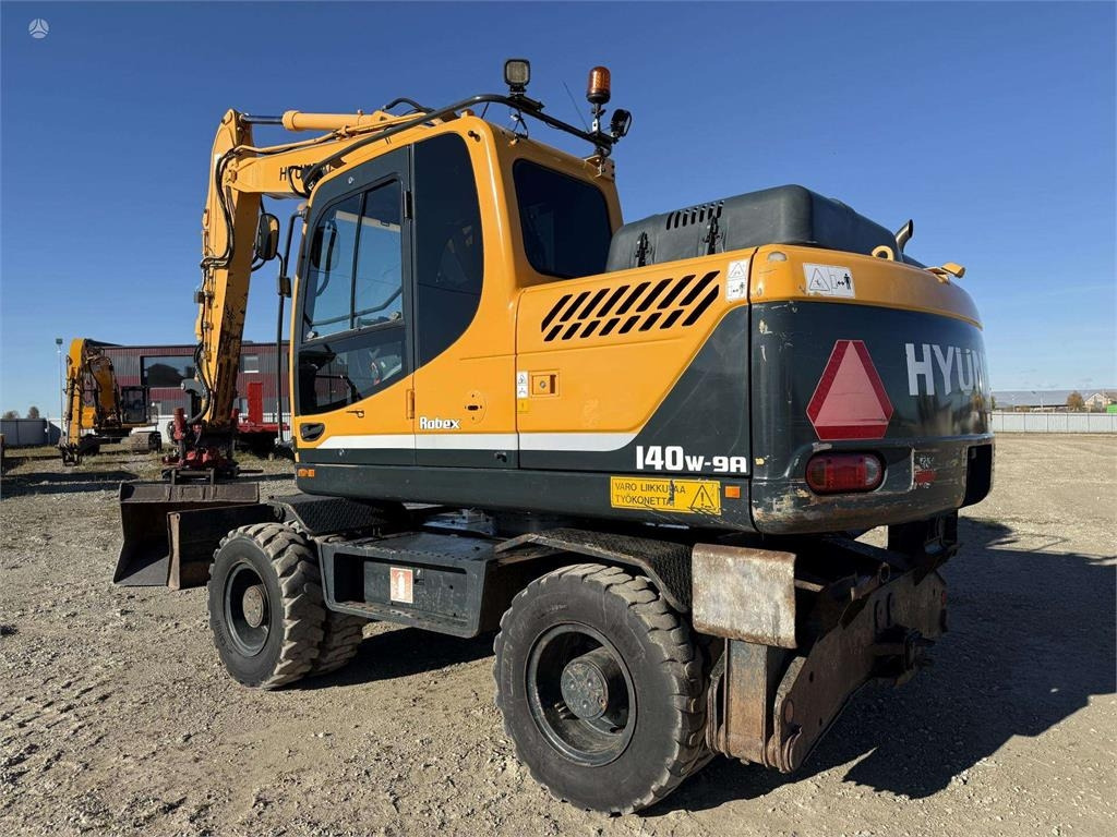 Hyundai Robex 140 W-9A Rototilt + grap - حفار ذو عجلات: صورة 3 Hyundai Robex 140 W-9A Rototilt + grap - حفار ذو عجلات: صورة 3