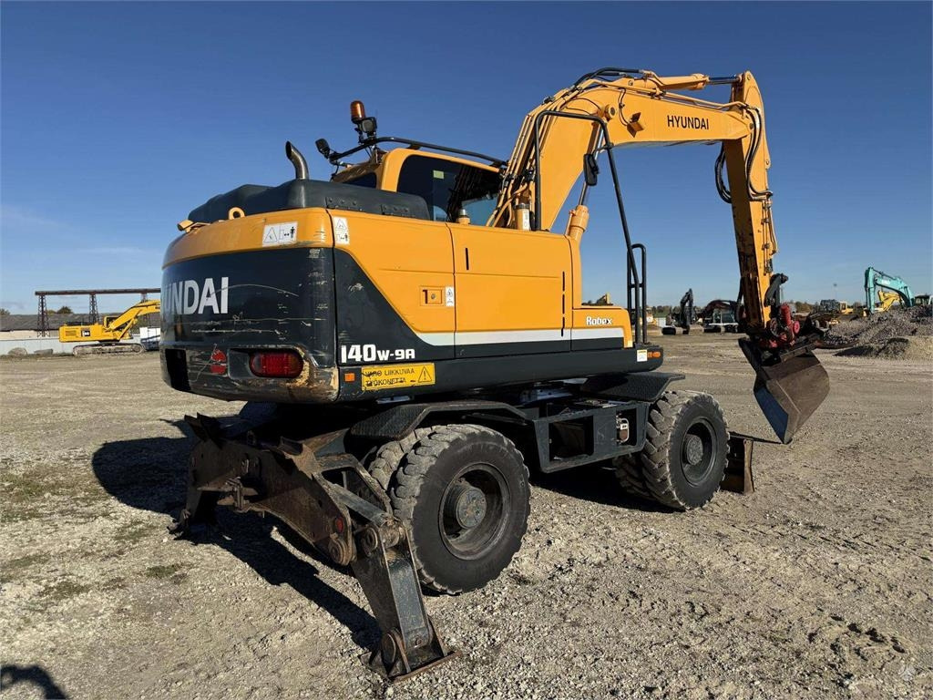 Hyundai Robex 140 W-9A Rototilt + grap - حفار ذو عجلات: صورة 4 Hyundai Robex 140 W-9A Rototilt + grap - حفار ذو عجلات: صورة 4