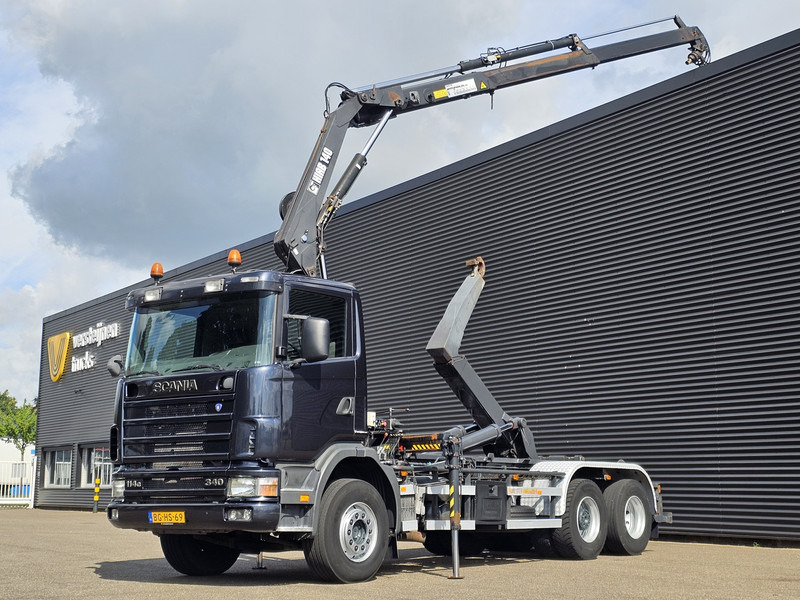 Scania R114.340 6x2 / HIAB CRANE + 25T HOOKLIFT - شاحنة برافعة خطافية, شاحنة كرين: صورة 1 Scania R114.340 6x2 / HIAB CRANE + 25T HOOKLIFT - شاحنة برافعة خطافية, شاحنة كرين: صورة 1