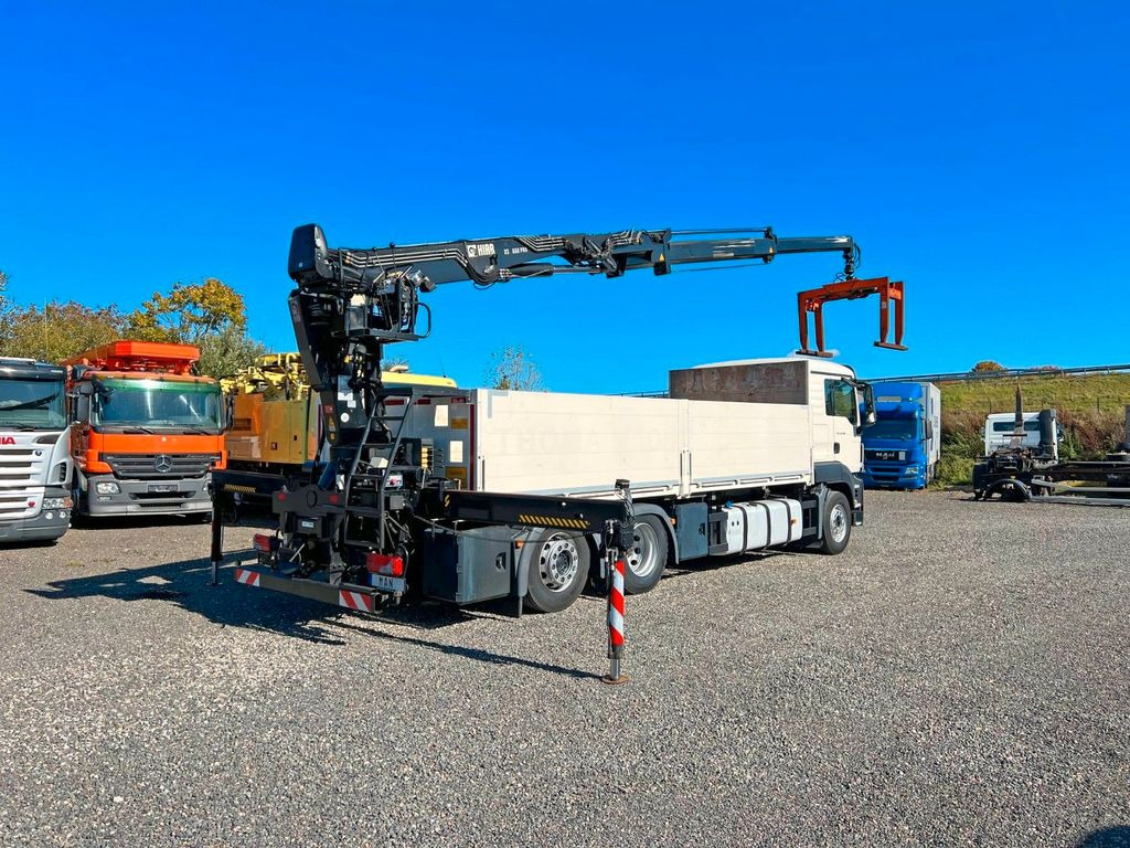 MAN 26.480 6X2 Baustoff mit Kran HIAB Top Zustand MAN 26.480 6X2 Baustoff mit Kran HIAB Top Zustand - شاحنة كرين, شاحنات مسطحة: صورة 1 MAN 26.480 6X2 Baustoff mit Kran HIAB Top Zustand MAN 26.480 6X2 Baustoff mit Kran HIAB Top Zustand - شاحنة كرين, شاحنات مسطحة: صورة 1